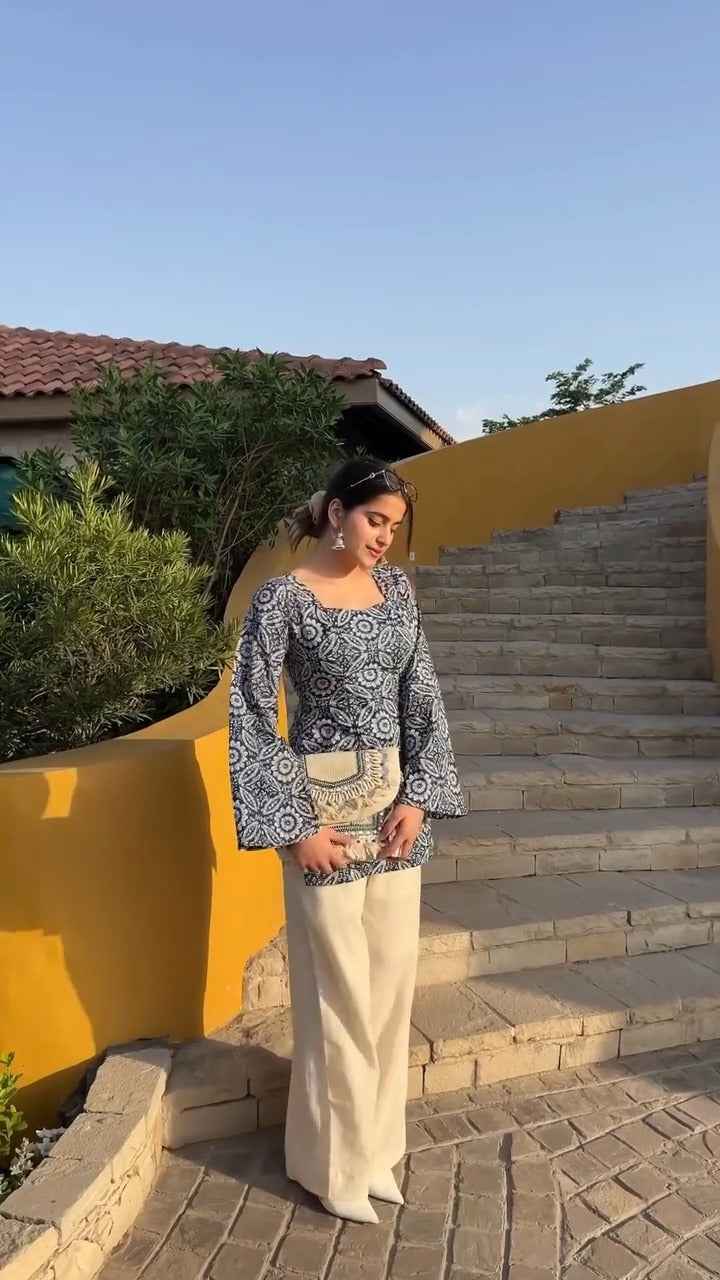 printed kurta with bell sleeves.