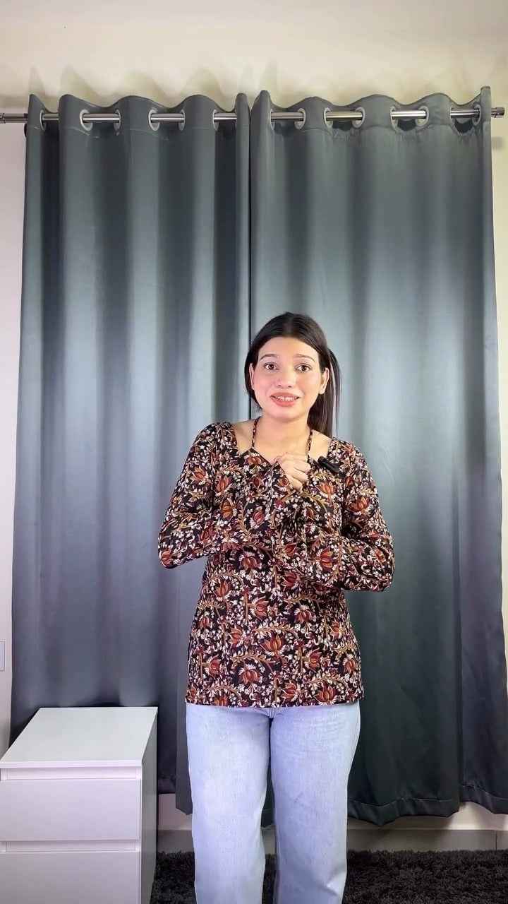 floral printed top or tunic( fabric is likely breathable, Poly rayon)