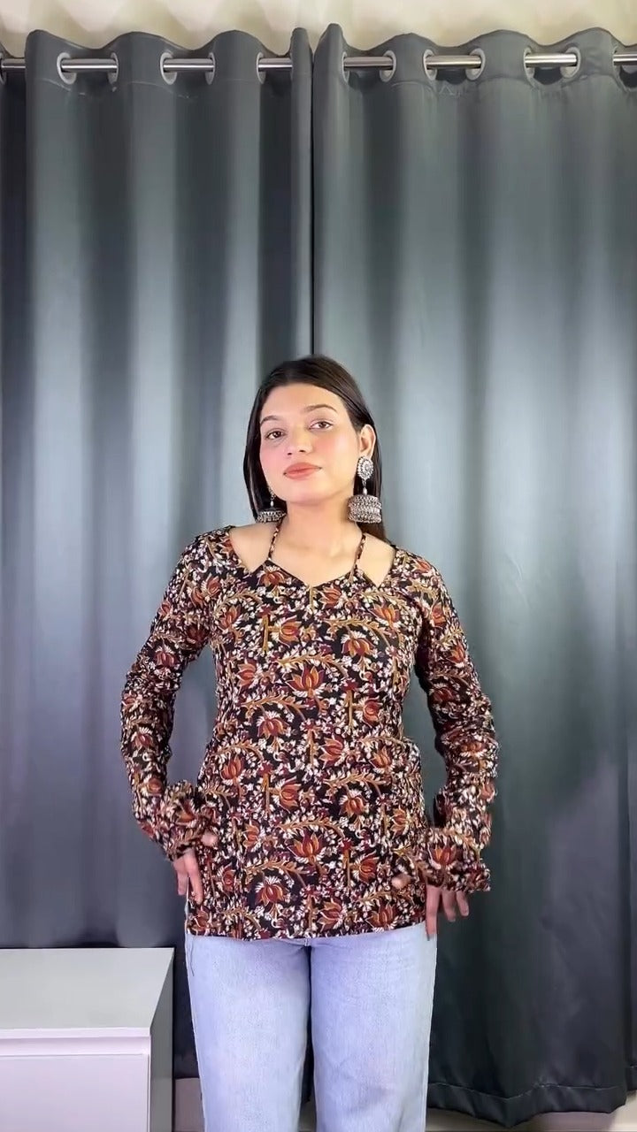 floral printed top or tunic( fabric is likely breathable, Poly rayon)